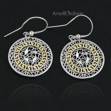 Silver earrings circle with the center covered with 24 carat gold. 