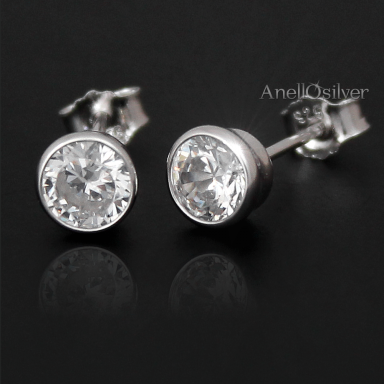 Silver, rhodium plated earrings with round zircon.