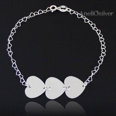 Silver bracelet with 3 hearts engraved on it